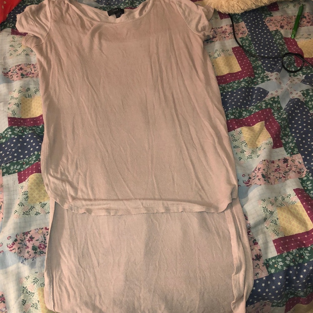 I am selling a cream colored shirt.